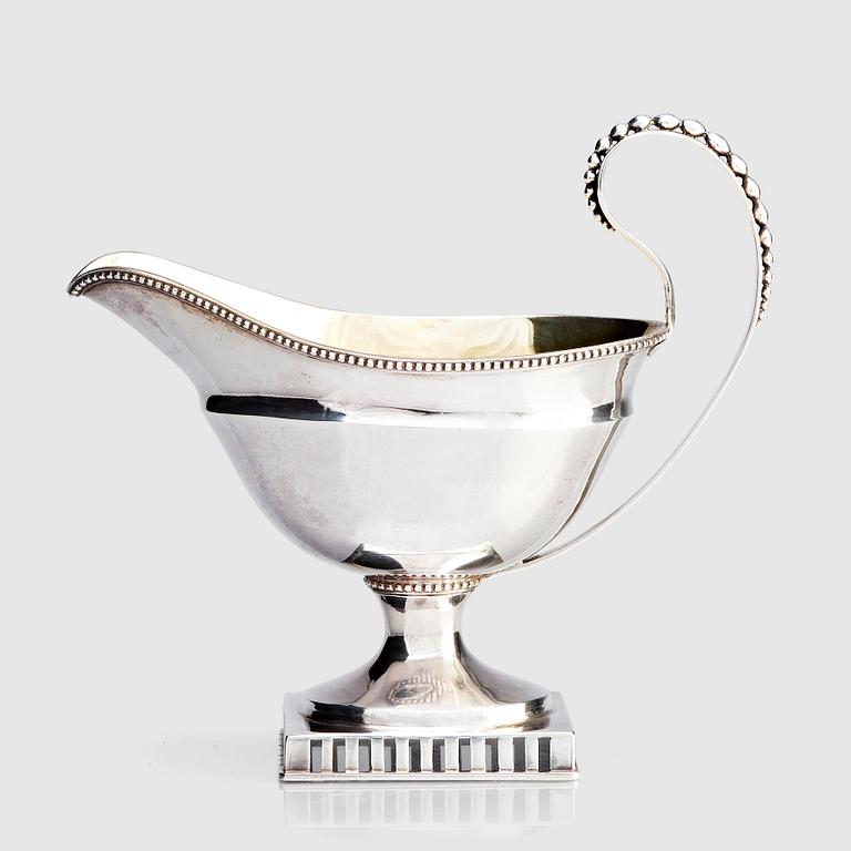 A Swedish Gustavian parcel-gilt silver cream-jug, mark of Petter Gillberg, Varberg 1790.