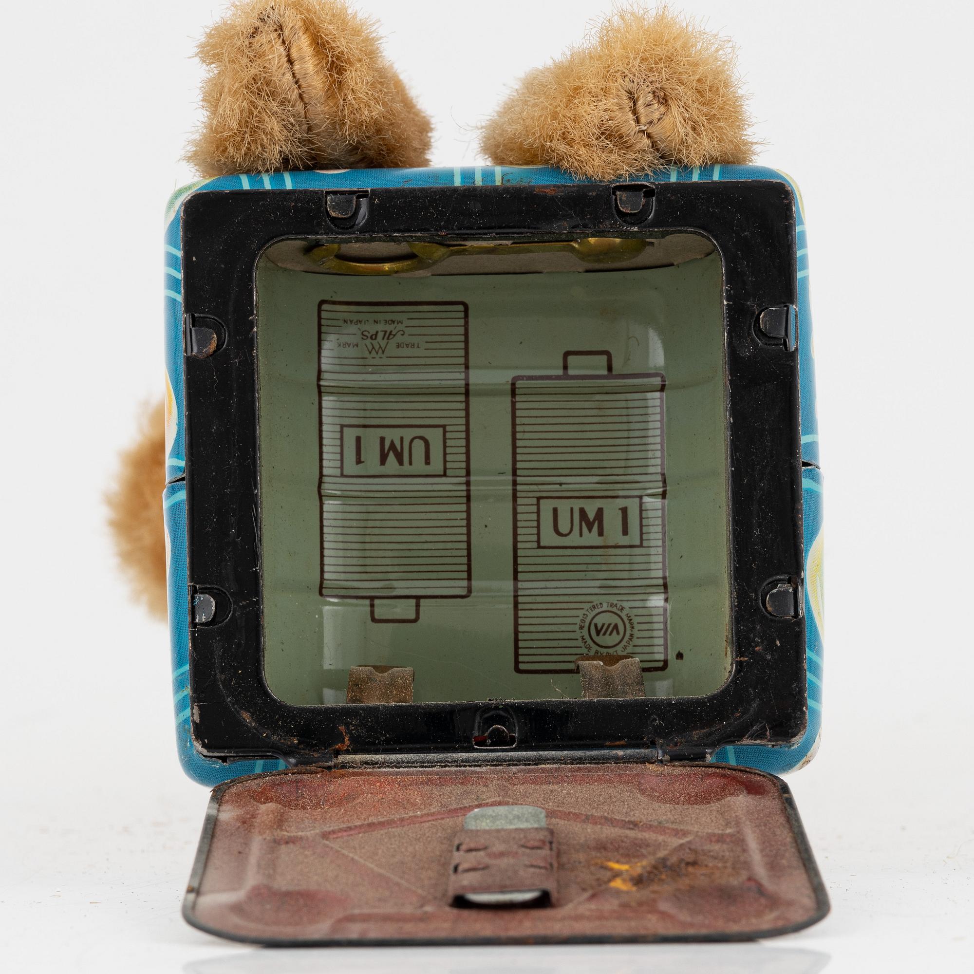 A set of five toys, including 'Rolly' clown from Schuco, 20th century.