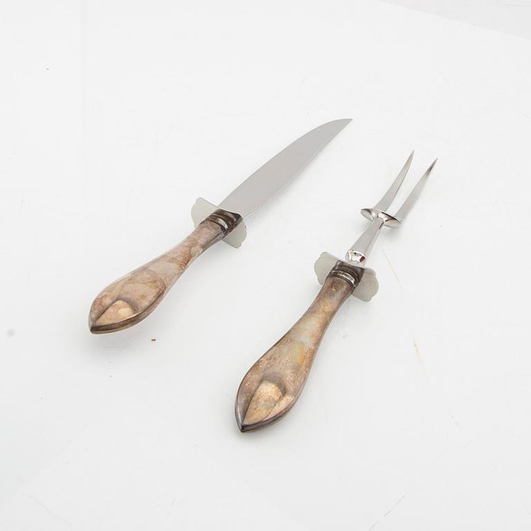 Cartier, carving knife in silver-plated metal, second half of the 20th century.