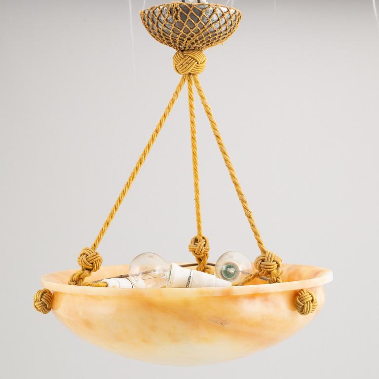 A 1910's/20's alabaster ceiling lamp.