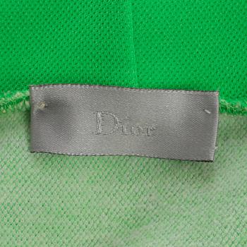 DIOR HOMME, a neon green cotton blend hoodie.