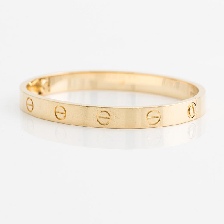 An 18K gold Cartier bracelet "Love".