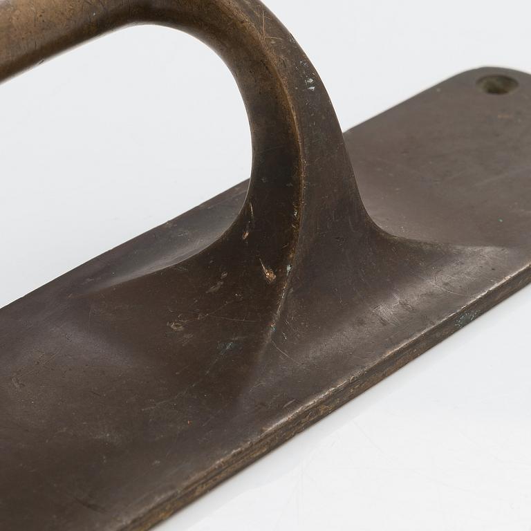 An Art Nouveau door handle from early 20th century.