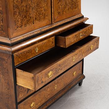 A burr alder, elm, and gilt-brass mounted late Baroque cabinet, first part of the 18th century.