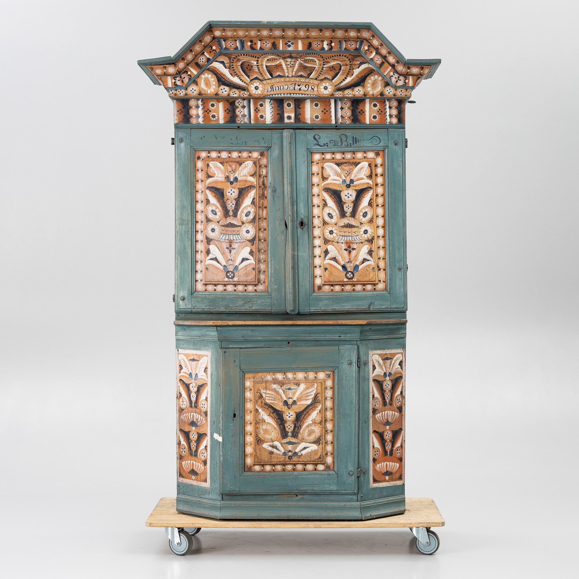A Dalecarlian polychrome painted cabinet, dated 1798.