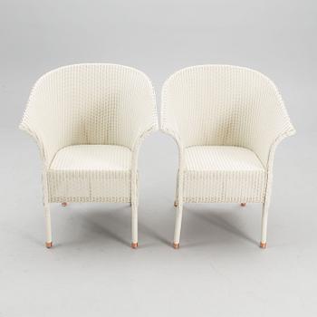 A PAIR OF ARM CHAIRS, Lloyd Loom, Spalding, England,  21st century.