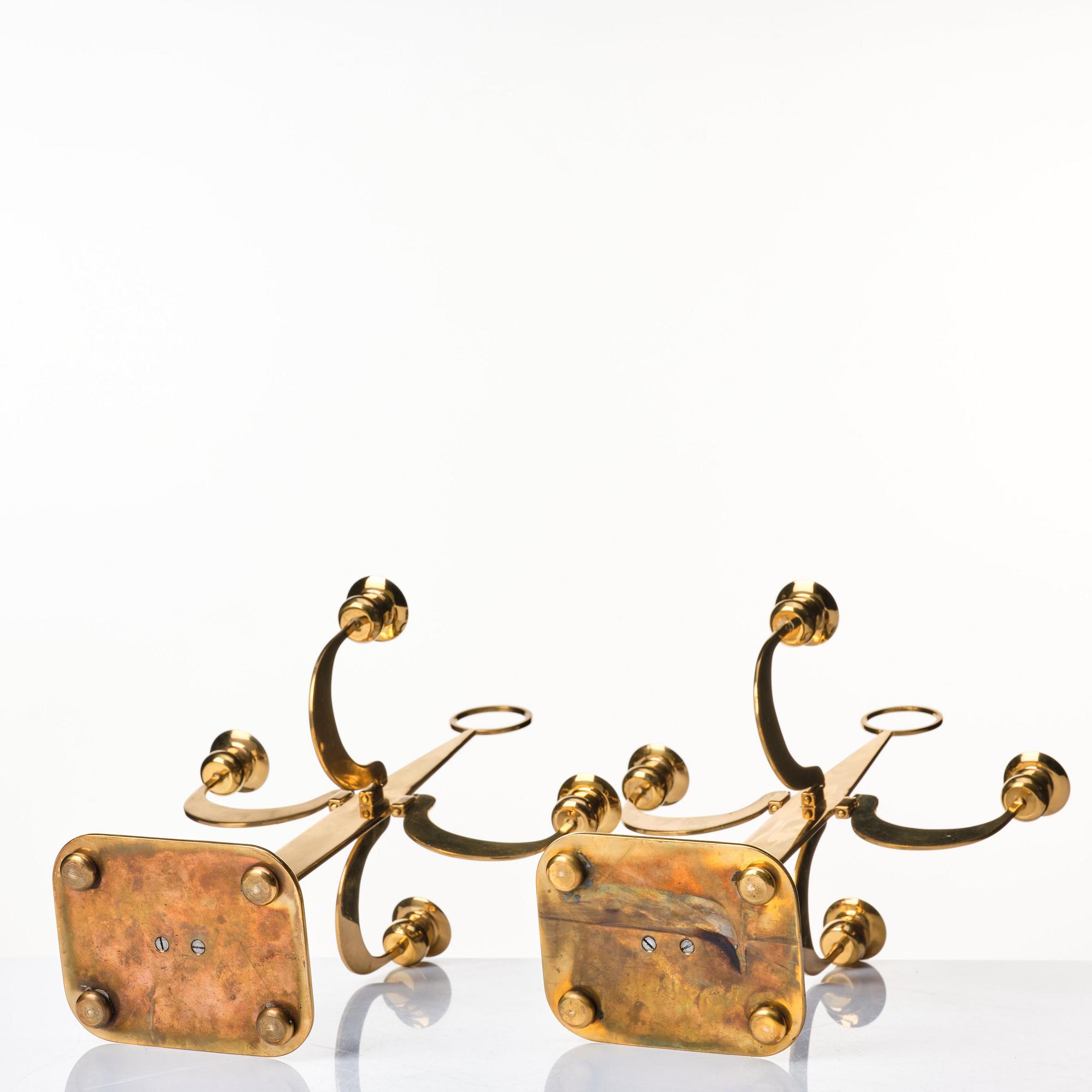 Josef Frank, a pair of brass candelabra by Svenskt Tenn, Sweden 1950's, model nr 2663.