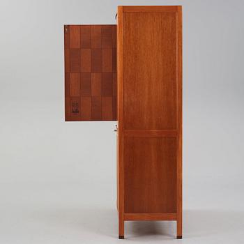 David Rosén, a mahogany and teak cabinet, for Stockholm's Association of Crafts, signed and dated 1959.