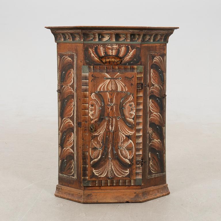 Corner hanging cabinet dated 1798.