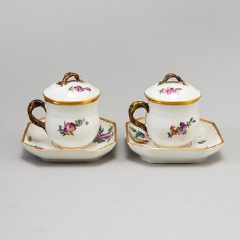 A set of 18 Royal Copenhagen Saxon Flower 1542 Custard Cups with Lids and Saucers.