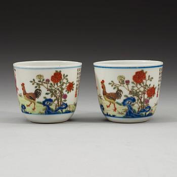 A pair of famille rose rooster cups, China, second half of 20th Century, sealmark in red.