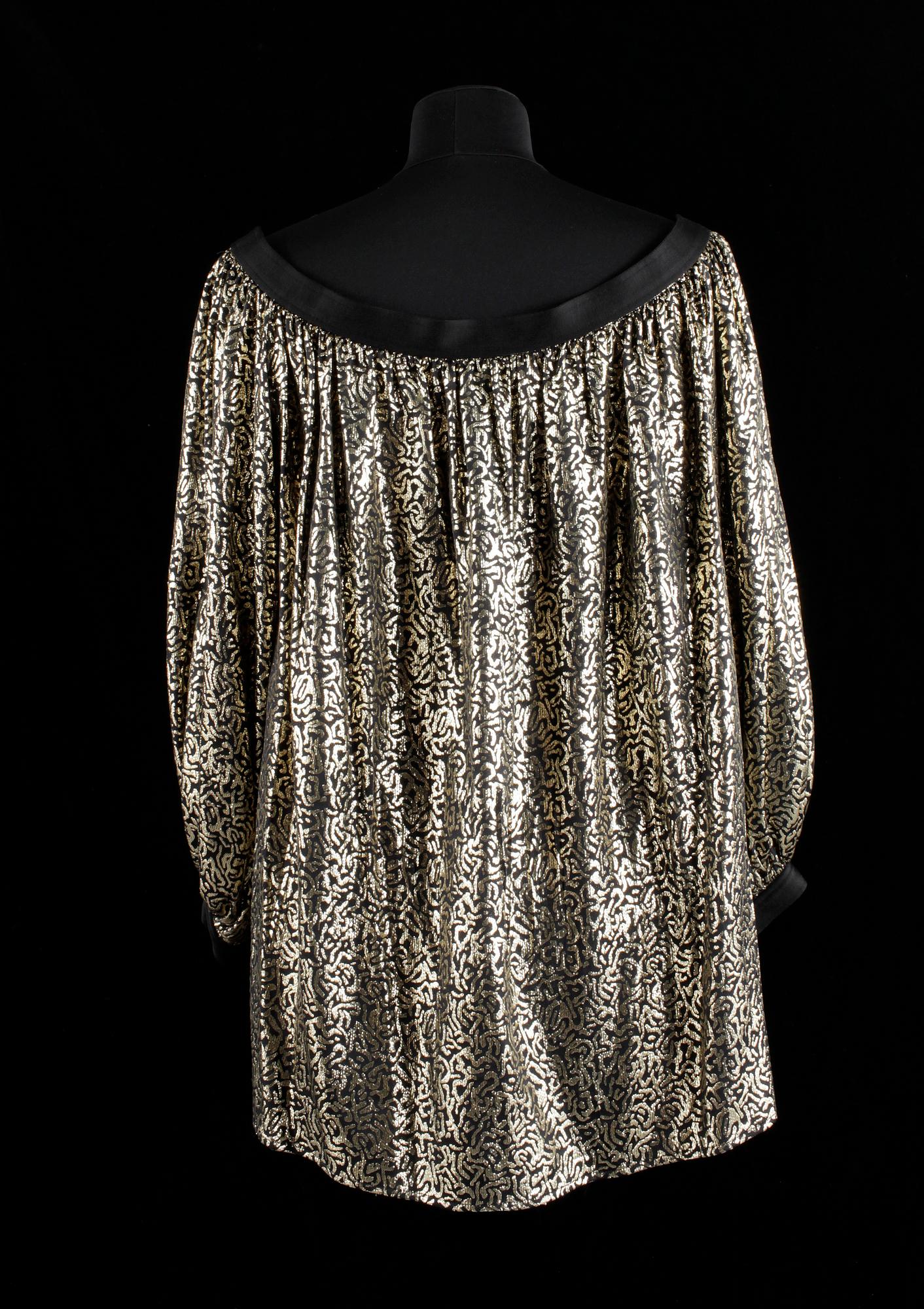 A georgette blouse by Yves Saint Laurent.
