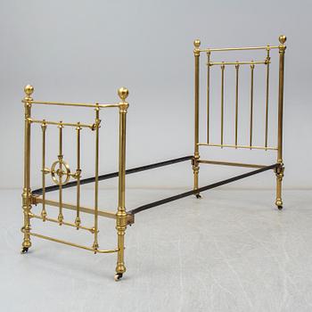 A late 19th or early 20th century bedframe.