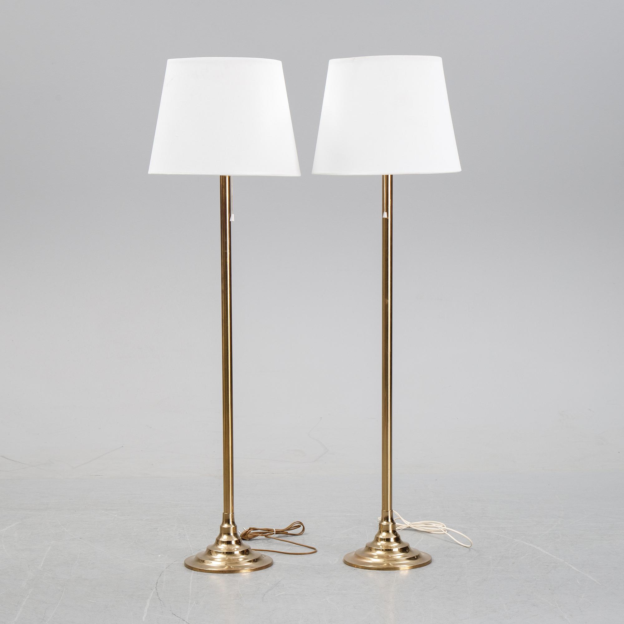 Bergboms, a pair of model 'G-024' brass floor lamps. Second half of the 20th century.