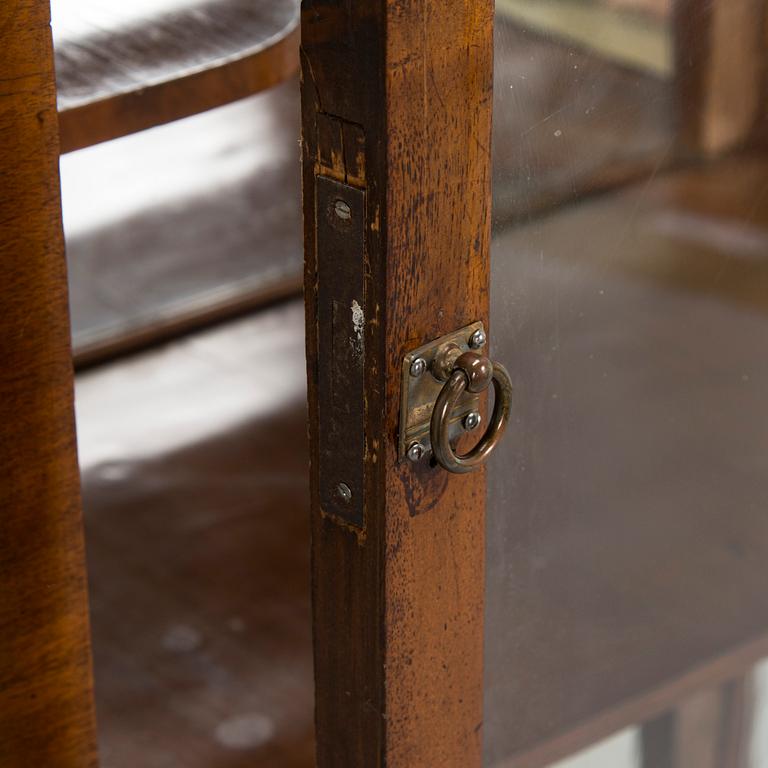 A mid-19th-century vitrine cabinet, possibly from the Baltics.