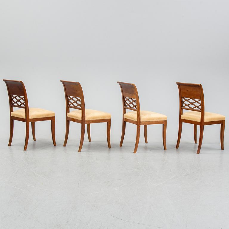 A set of four empire style mahogany chairs, first half of the 20th Century.