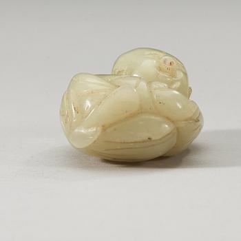 A Chinese nephrite figure of a boy.