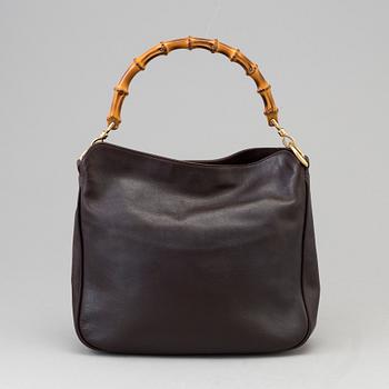 A Gucci leather bag.