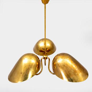 A 1940s Carl-Axel Acking brass ceiling pendant from Bröderna Malmströms.