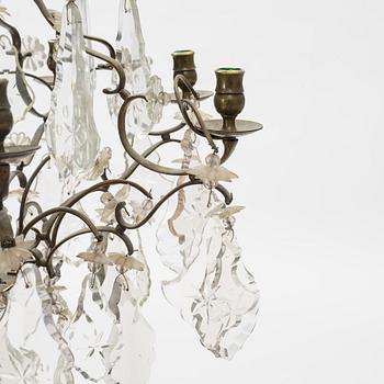 Ljuskrona. rokokostil, omkring år 1900.