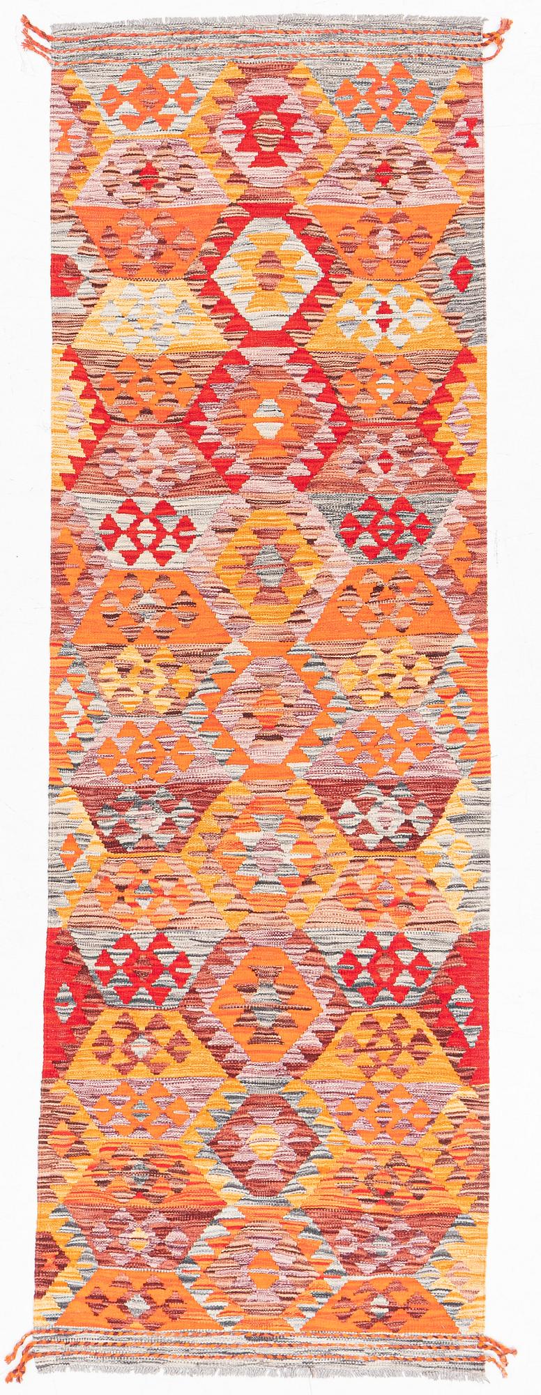 A Kilim runner, c. 255 x 85 cm.