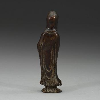 A bronze standing Guanyin holding a ruyi-scepter, Qing dynasty, 18th century.