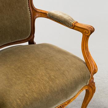 A pair of mid 20th century rococo style armchairs.