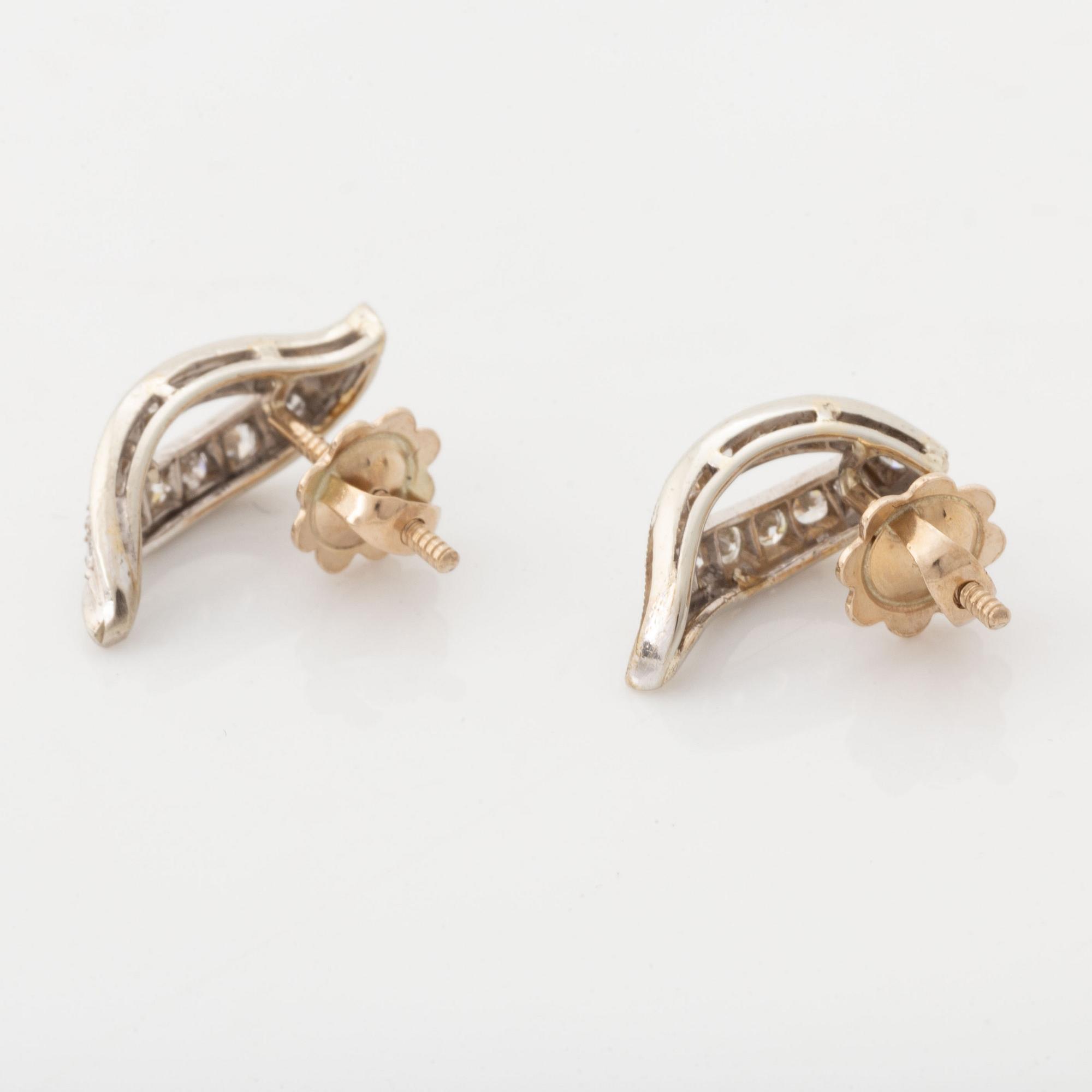 Leaf shaped diamond earrings.