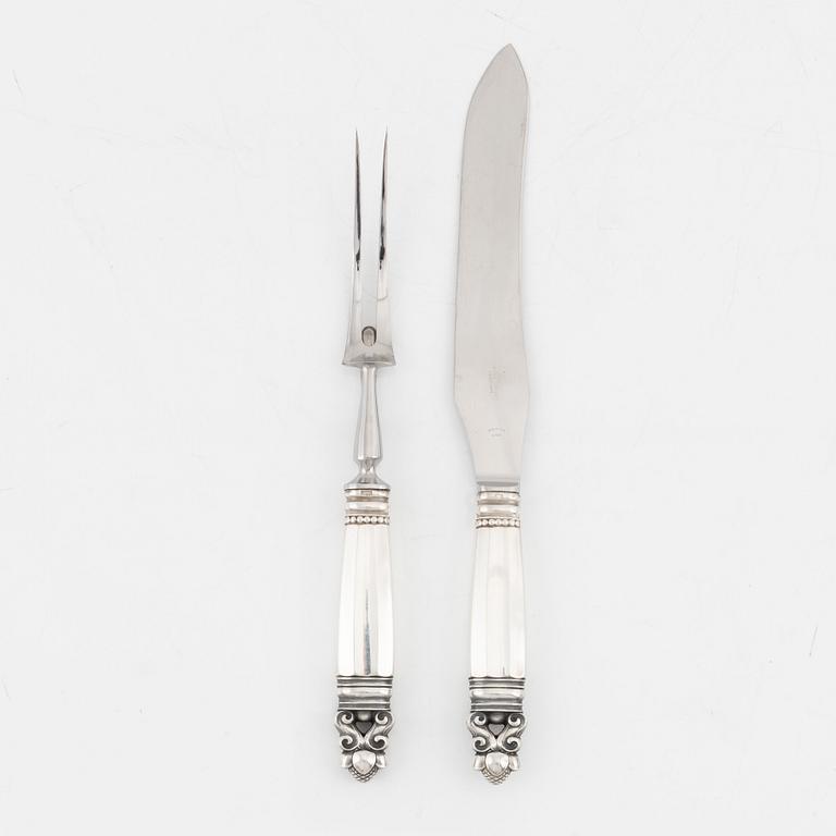 Johan Rohde, A sterling silver carving knife and fork set, 'Konge/Acorn', Georg Jensen, Denmark.
