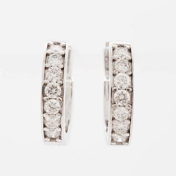 Brilliant-cut diamond  hoop earrings.