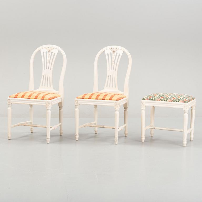A dining table with eight chairs and a stool, Gustavian style, second half of the 20th Century.