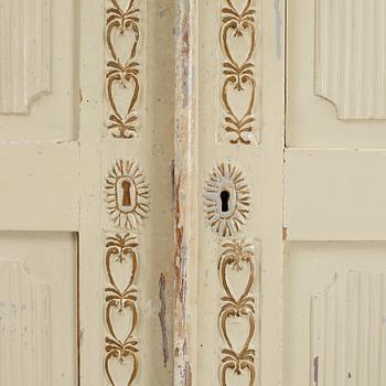 A late Gustavian cabinet, early 19th century.