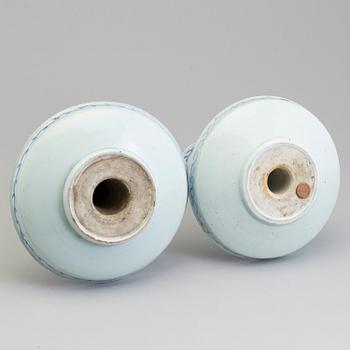 A large pair of Chinese blue and white porcelain incense holders/candle holders, Qing dynasty, 19th century.