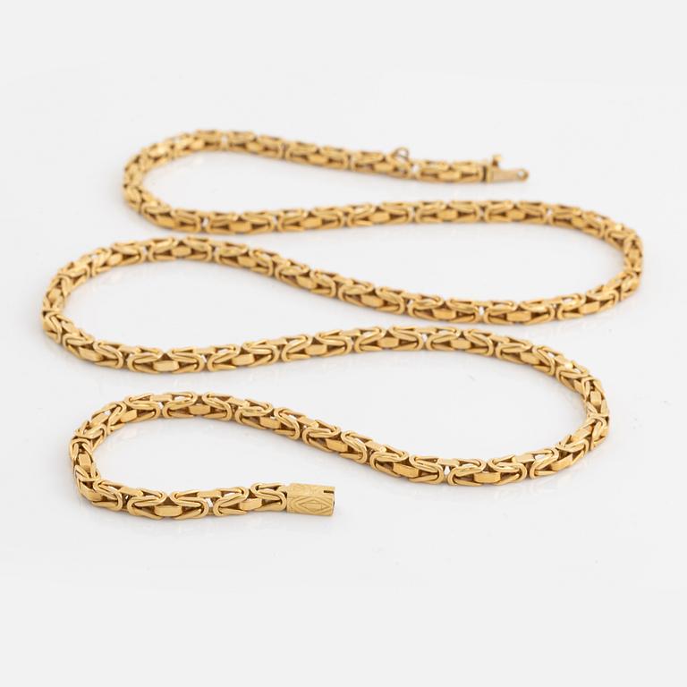 An 18K gold Meister necklace.