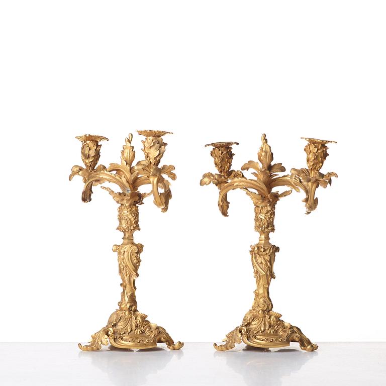 A pair of Neo-Rococo 1840's two-light gilt bronze candelabra.