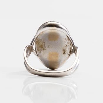 RING, 18K guld, opal 0,25 ct, diamanter. 1980-tal. Vikt 7,4 g.