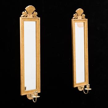 A pair of Swedish mid 20th century Gustavian style wall sconces from Kurt Ekvall in Nyköping.