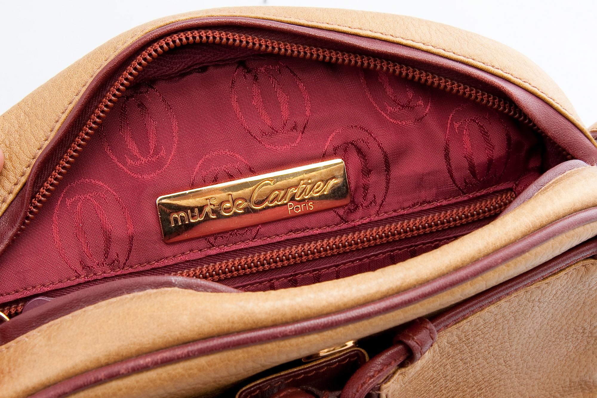 A HANDBAG, Cartier.