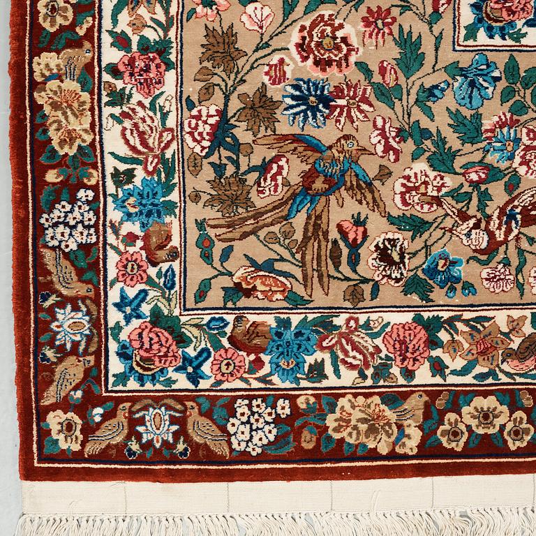 A CARPET, "Golo Bolbol" (="Flower and bird"-motive), a silk Esfahan figural, ca 337 x 243,5 cm, Mohammad Seirafian.