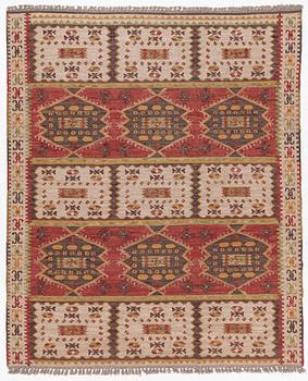 A Kilim carpet, c. 305 x 250 cm.