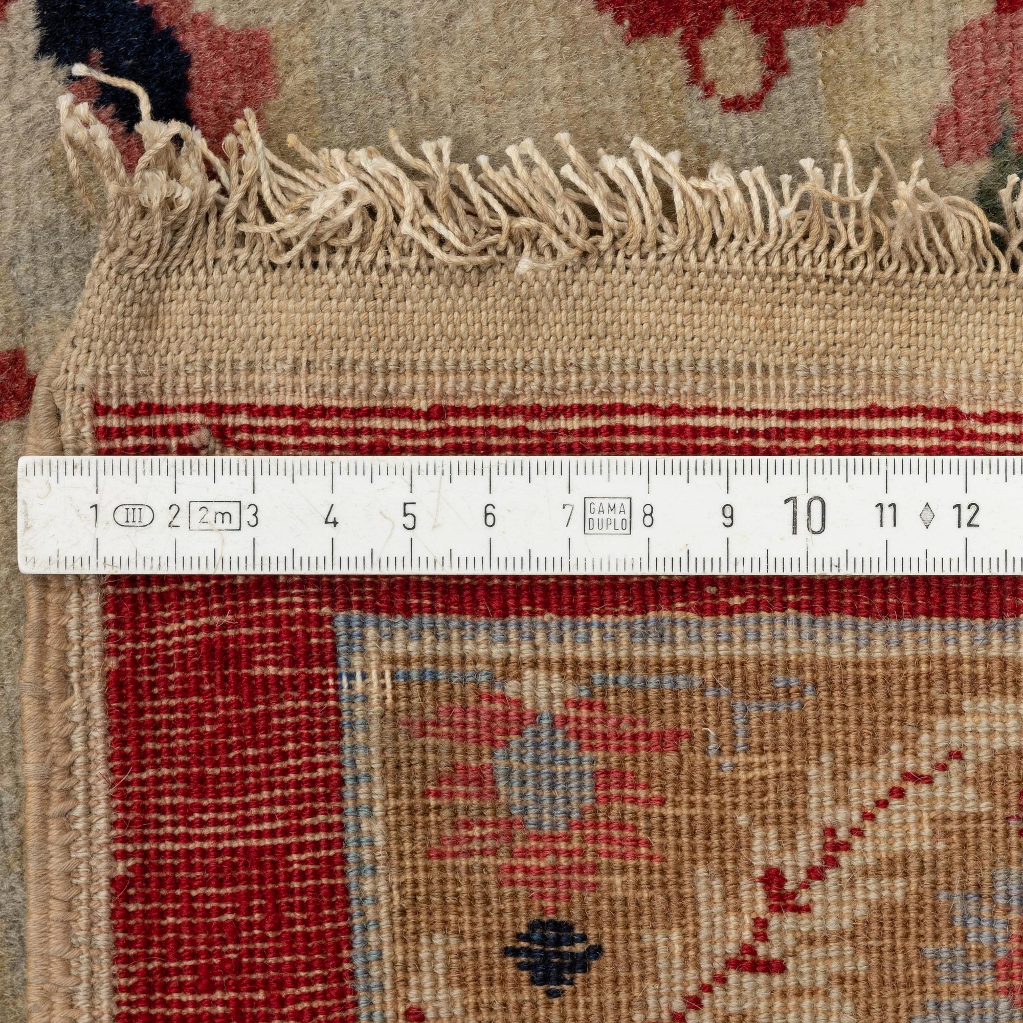An antique 'Haj Jalili' Tabriz carpet, Northwest Persia, c. 435 x 395 cm.