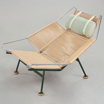 Hans J. Wegner, a 'Flag Halyard' easy chair, Getama, Denmark.