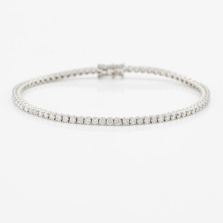 Tennis bracelet, 18K white gold with brilliant-cut diamonds.