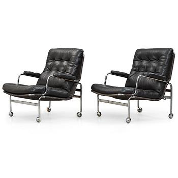 20. Bruno Mathsson, a pair of "Karin" easy chairs, DUX, Sweden post 1969.