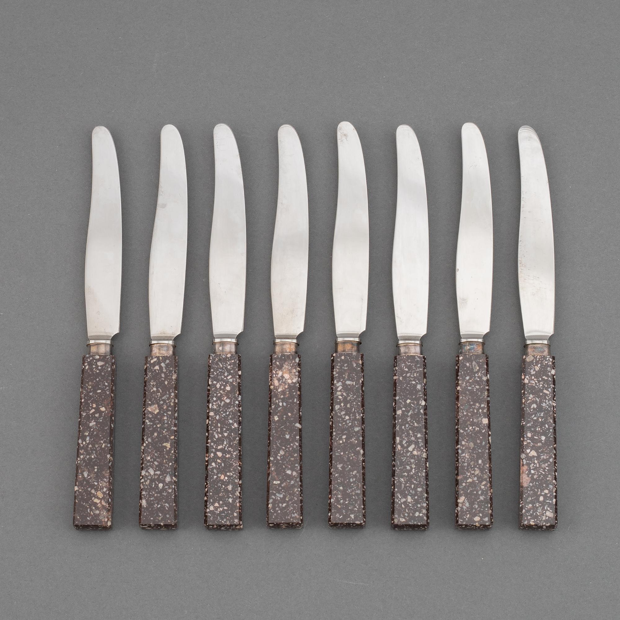 A set of eight porphyr knives, early 20th century.
