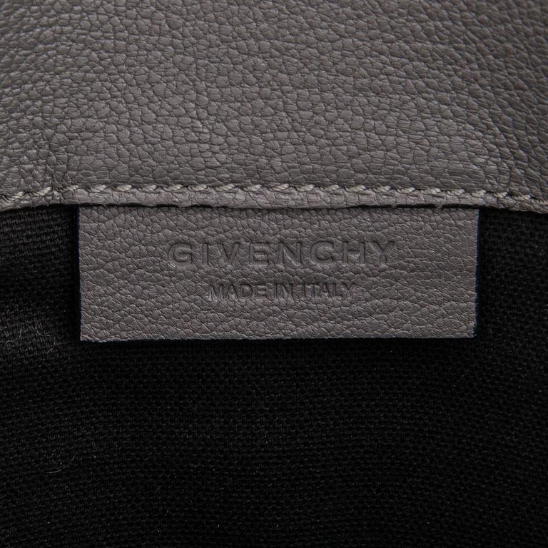 Givenchy, A 'Antigona' goat leather clutch.