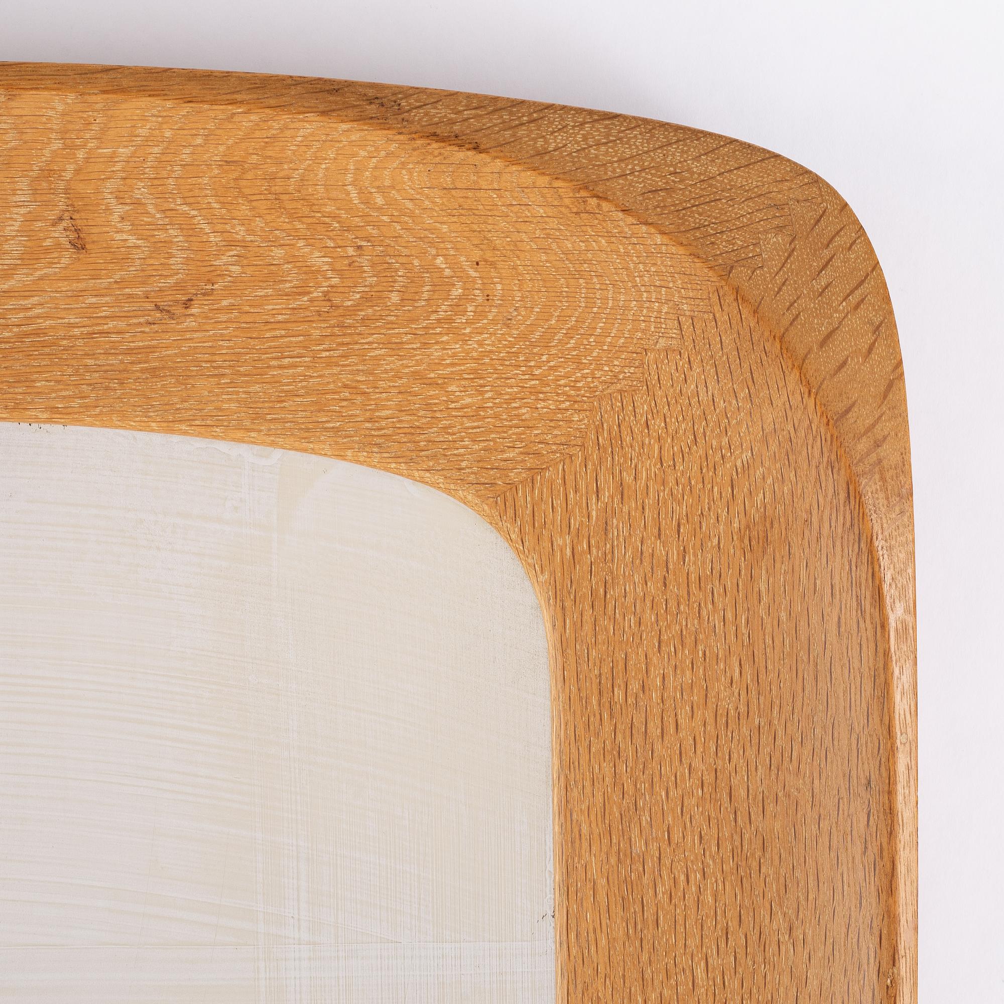 A pair of oak mirrors from Glas & Trä, dated 1961.