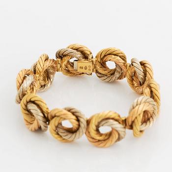 An 18K gold bracelet.