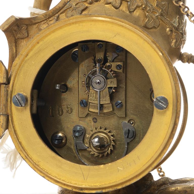 An Empire table clock, likely Northern Europe, early 19th century.