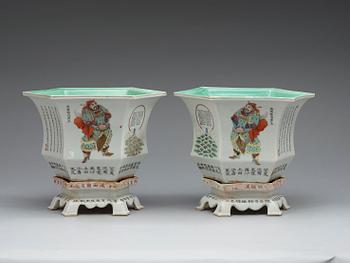 A pair of flower pots with stands, China, 20th Century.